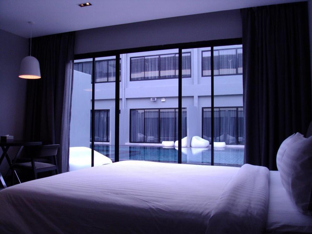 S Ratchada Leisure Hotel - Sha Plus بانكوك المظهر الخارجي الصورة A bedroom at the hotel