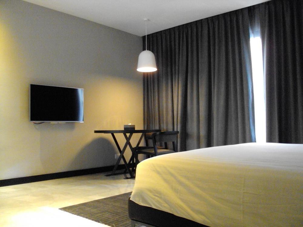 S Ratchada Leisure Hotel - Sha Plus بانكوك المظهر الخارجي الصورة A room at the hotel