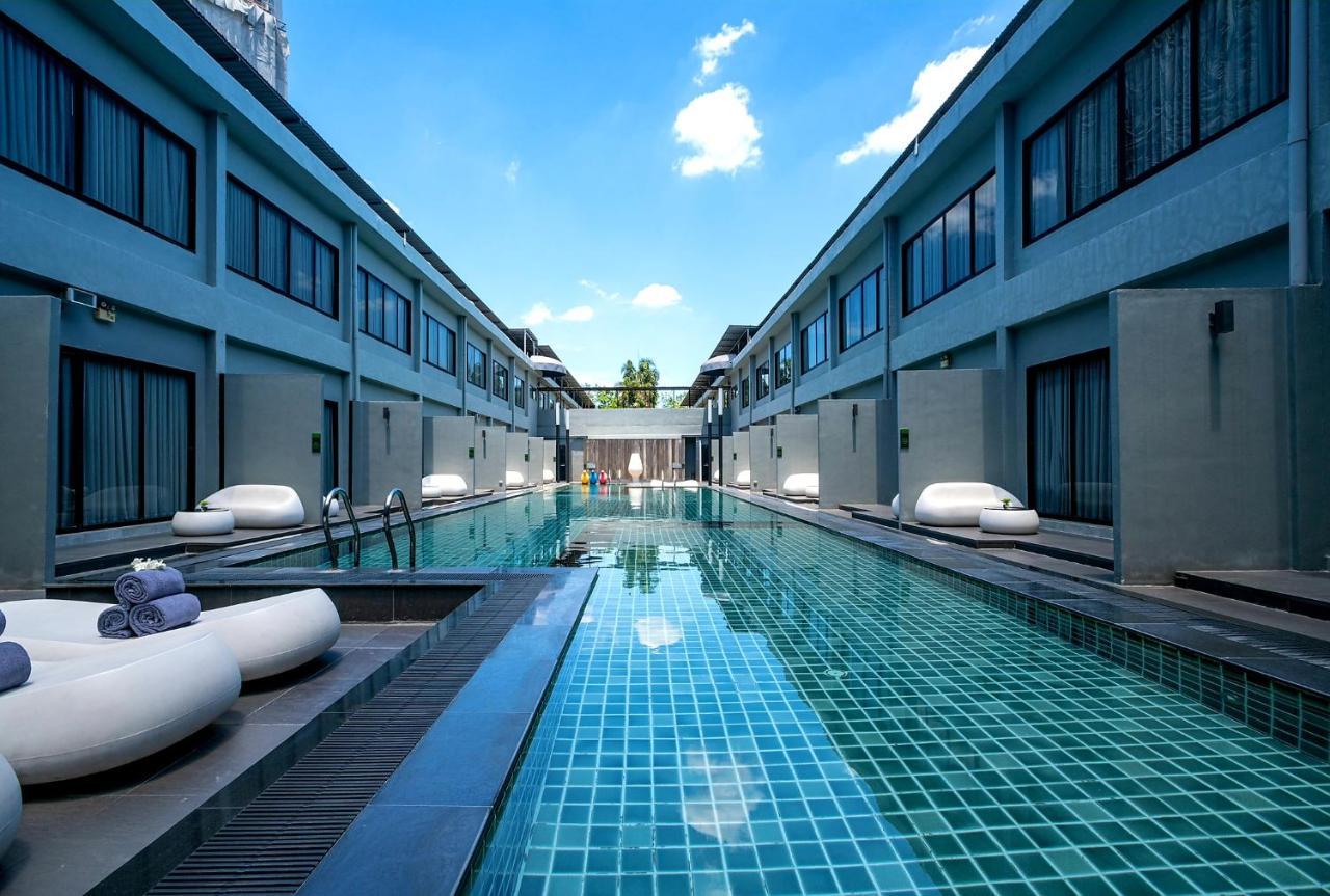 S Ratchada Leisure Hotel - Sha Plus بانكوك المظهر الخارجي الصورة The swimming pool at the hotel